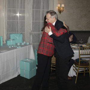 Southampton's Top Producer Michael Gary gets a hug from Judi Desiderio